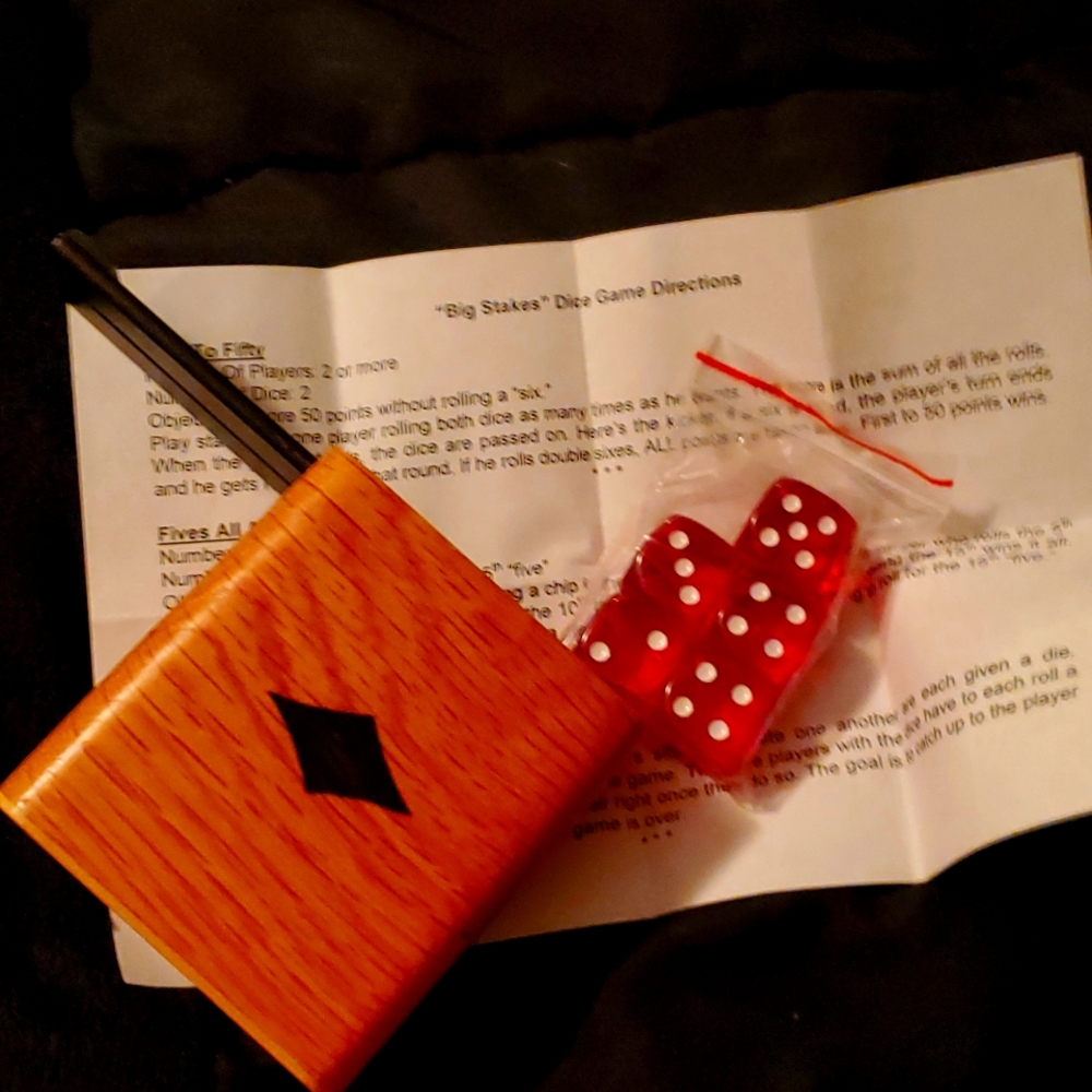 Wooden dice container with dice, j game suggestion